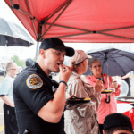 Metro Police Officer eating at the catered food bar.