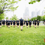 Police offers standing at attention in Nashville park.